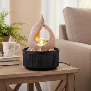 Side view showing the 17x17x24 cm dimensions of Amazon Basics Tabletop Fountain